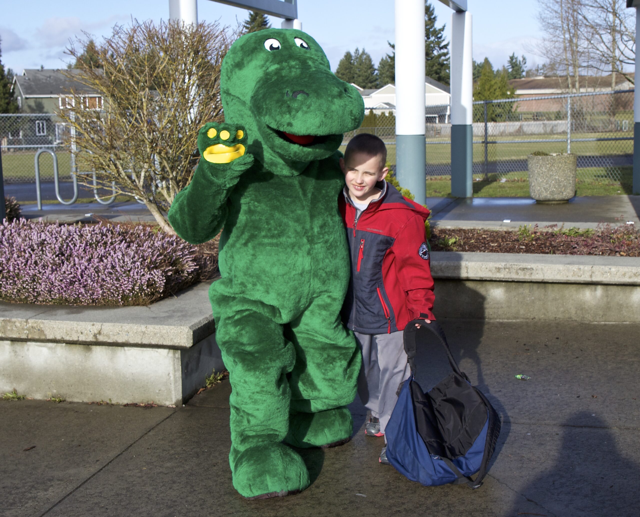 Charlie’s Dinosaur “CB” delivers books
